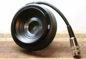 Rollei electronic shutter size 0 from the front with the behind-the-lensboard adapter installed