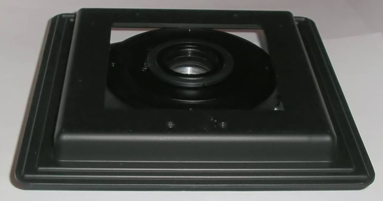 Rollei electronic shutter size 0 with an Arca Swiss 171mm x 171mm to 110mm x110mm rear format frame reducer sitting on it